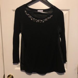 Long sleeve black top with jewel neckline